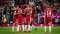 The image shows FC Bayern players celebrating against VfB Stuttgart during the 2026 season.