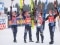 The image shows four winter sports enthusiasts from the Viessmann team.