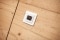 The image shows a room thermostat in Eric Frenzel's extension. 
