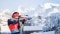 The image shows a biathlete shooting. 