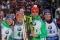 The image shows Benedikt Doll and three other athletes. 