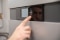 The picture shows Arnd Peiffer in front of the display of the Viessmann heating