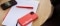 Das Bild zeigt ein Viessmann Handy und weiteres Arbeitsmaterial