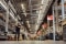 The picture shows several employees in a rack warehouse.