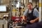 The picture shows a Viessmann Climate Solutions employee at work in the production