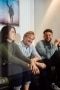 The image shows happy employees of Viessmann Climate Solutions