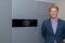 The image shows Christian Engelke in front of a Viessmann product.
