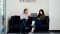 The image shows Viessmann employees in the office