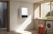 The image shows the Viessmann Vitodens mounted on a wall
