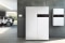 The image shows Vitovalor PT2 fuel cell heating device with Vitocharge VX3 power storage system (right) from Viessmann