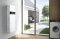 The picture shows the Viessmann Vitocharge VX3 power storage system in a domestic environment.