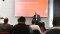 The image shows Dr. Karsten McGovern at the Forum for Municipal Climate Protection at Viessmann