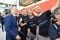 The image shows Olaf Scholz with Viessmann employees.