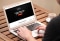 The image shows viessmann.de website on a laptop screen