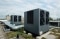 The image shows two Vitocal 200-A PRO air-to-water heat pumps on the roof of the aparthotel.