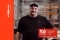 The image shows a Viessmann employee and the logo of the Top Employer award
