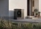 The image shows a Vitocal 200-A ie outdoor unit in front of a house