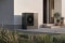 The image shows the Viessmann Vitocal 250-A ie heat pump mounted on the side of a house.