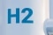 The image shows a hydrogen gas tank close up